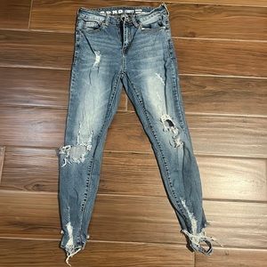 Skinny cropped distressed medium wash high rise jean